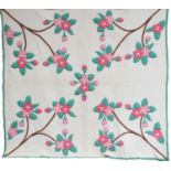 Circa 1935 Canadian Blossoms Pattern Quilt, comprising pink appliqué and padded blossom flower heads