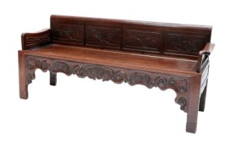 A Late 19th/Early 20th Century Chinese Hardwood Bench, the back support and arms carved with six