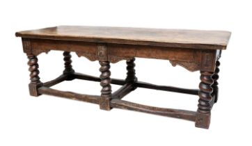 A Charles II-Style Oak Refectory Table, late 19th century, of three-plank construction above a plain