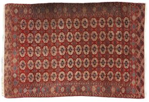 ~ Tekke Carpet Emirate of Bukhara, circa 1900 The deep madder field with five columns of güls