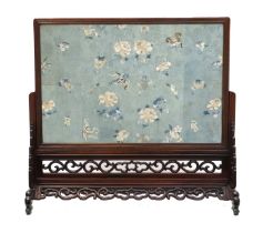 A 20th Century Chinese Hardwood Table Screen, the removable rectangular panel inset with blue floral