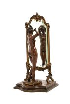 Emil Pinedo (1840-1916): A Bronze Figure of a Girl, standing on a cushion combing her hair in