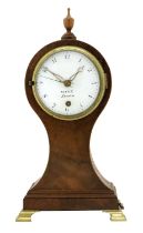 A Mahogany Balloon Shaped Centre Seconds Mantel Timepiece, signed Steele, London, circa 1810, urn