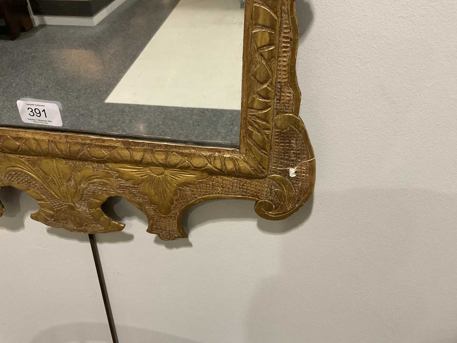 A George II Carved Giltwood Mirror, circa 1740, the plain mercury plate within a carved border, - Image 4 of 12
