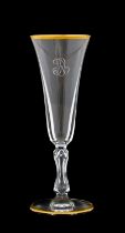 A Set of Twenty St Louis Champagne Flutes, the slender trumpet-shape bowls engraved with a