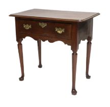 A George II Walnut and Crossbanded Side Table, mid 18th century, the moulded top with an oak-lined