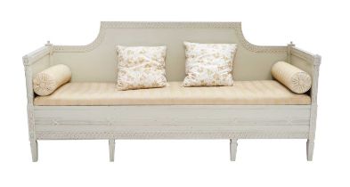 ~ A Late 19th Century Cream Painted Day Bed, recovered in classical yellow floral striped fabric