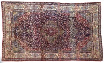 ~ Kashan Silk Carpet Central Iran, circa 1930 The indigo field profusely decorated with scrolling