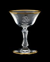 A Set of Twenty-Three Champagne Saucers, en suite 13cm high