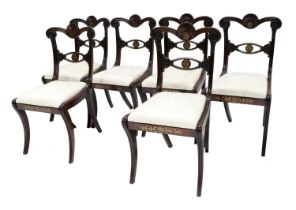 A Set of Six Regency Rosewood and Brass-Inlaid Dining Chairs, early 19th century, recovered in cream