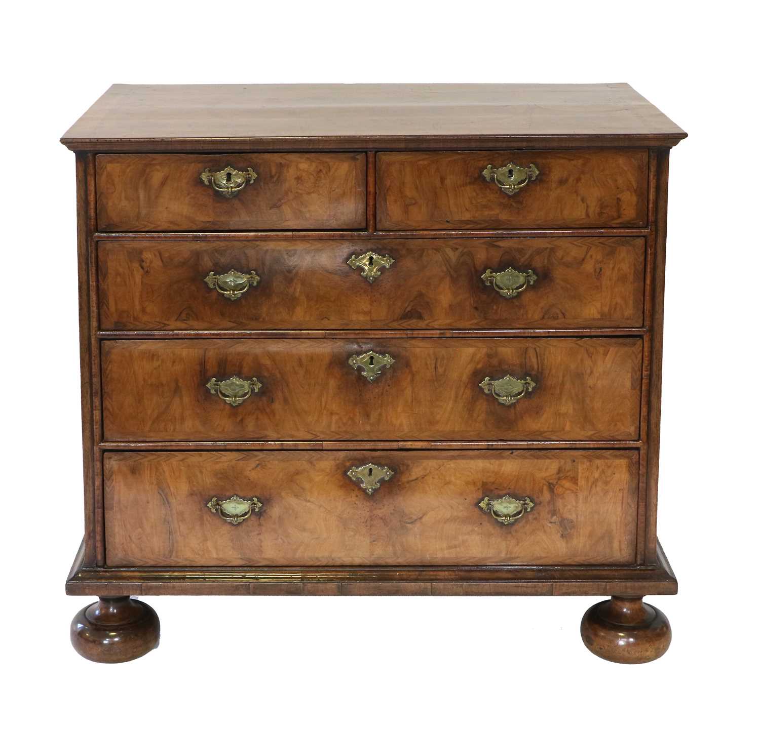A Queen Anne Walnut, Featherbanded and Crossbanded Straight-Front Chest of Drawers, circa 1710,