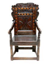 A 17th Century Joined Oak and Parquetry-Decorated Wainscot Armchair, probably Yorkshire/Leeds, the