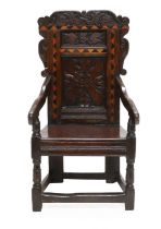 A 17th Century Joined Oak and Parquetry-Decorated Wainscot Armchair, probably Yorkshire/Leeds, the