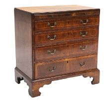 A George II Figured Walnut and Boxwood-Strung Straight-Front Chest of Drawers, circa 1740, the