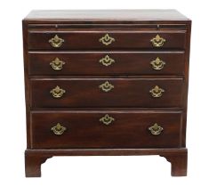 A George II Red Walnut Straight-Front Chest of Drawers, circa 1750, the crossbanded and moulded