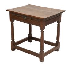A Joined Oak Side Table, late 17th century, with moulded frieze drawer on turned tapering legs