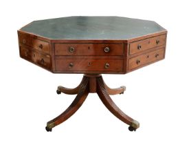 A Regency Mahogany and Ebony-Strung Octagonal Library Table, early 19th century, with an inset green