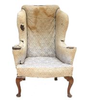 Howard & Sons: A George III-Style Walnut-Framed Wing-Back Armchair, late 19th/early 20th century,