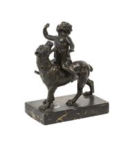 Italian School (19th century): A Bronze Group of a Boy Riding a Hound, on a veined marble base