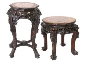 A Chinese Carved Padouk Wood and Pink Marble Circular Plant Stand, circa 1900, with foliate carved