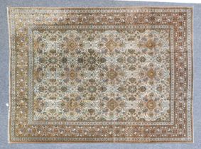 Kashan Carpet Central Iran, circa 1950 The ivory field with an allover design of boteh, medallions