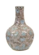 A Chinese Porcelain Millefleur Bottle Vase, Qing Dynasty, of ovoid form with cylindrical neck,