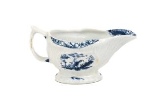 A Lowestoft Porcelain Butterboat, circa 1770, painted in underglaze blue with chinoiserie landscapes