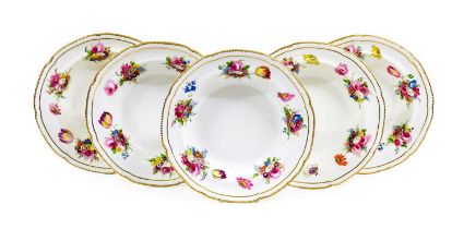 A Set of Five Swansea Porcelain Soup Plates, circa 1815, painted with flowersprays within a gilt