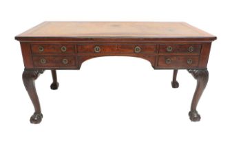 Holland & Sons: A Victorian Carved Mahogany Library Writing Table, 2nd half 19th century, the