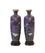 A Pair of Japanese Cloisonne Enamel Vases, Meiji period, of slender baluster form with flared necks,
