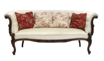 A Late 19th Century French Carved Walnut Two-Seater Sofa, recovered in cream floral silk damask,