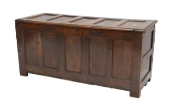 An 18th Century Joined Oak Chest, initialled AD and dated 1724, the five-panel hinged lid