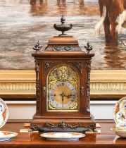 A Victorian Oak Chiming Table Clock, circa 1890, inverted pediment with urn shaped finials, gilt