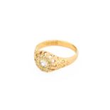 An 18 Carat Gold Diamond Cluster Ring, an old cut diamond within a border of rose cut diamonds, in