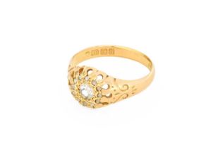 An 18 Carat Gold Diamond Cluster Ring, an old cut diamond within a border of rose cut diamonds, in