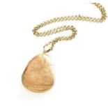 A 9 Carat Gold Locket on Chain, the irregular shaped locket engraved with a floral scene, on a