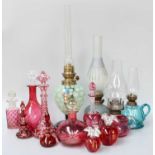 A Quantity of Coloured Glassware, including a dappled Vaseline glass oil lamp applied with a lizard,
