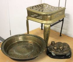 A 17th century German Brass Alms Dish, a 19th century brass footman, a reproduction bronze after