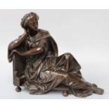 A Patinated Bronze Sculpture, 19th century, depicting St Cecilia, 28cm long