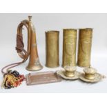 Three Trench Art Brass Shell Vases, a copper bugle, a brass inkstand, a lead-weighted copper