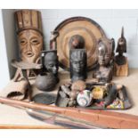 Ethnographica, including African carved hardwood busts, a beadwork and cowry shell collar, a similar