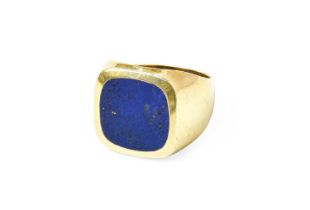 A Lapis Lazuli Signet Ring, stamped '585', finger size T The ring is in fair condition with wear