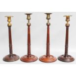 Two Pairs of Mahogany 19th Century Gilt Metal Mounted Candlesticks