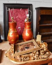 A Giltwood and Gesso Rococo Style Wall Shelf, together with two table lamps and a modern ebonised