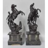 A Pair of Victorian Spelter Marly Horses, on slate and marble plinths, 52cm high