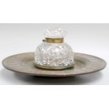 A Bronze Dish Formed Inkstand, 19th century, with a large cut glass inkwell mounted in the centre,