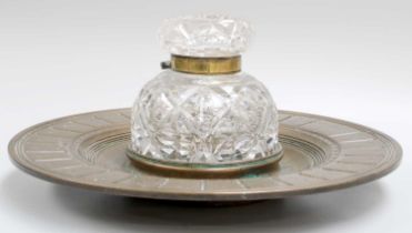 A Bronze Dish Formed Inkstand, 19th century, with a large cut glass inkwell mounted in the centre,