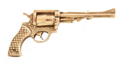 A 9 Carat Gold Novelty Brooch, in the form of a gun, measures 5.7cm by 2.7cm Gross weight 16.6