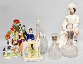 Four Staffordshire Flat Back Figures and Three Decanters, two with silver collars (one tray)