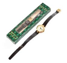 A Lady's Gucci Wristwatch, with Gucci box and spare Gucci strap